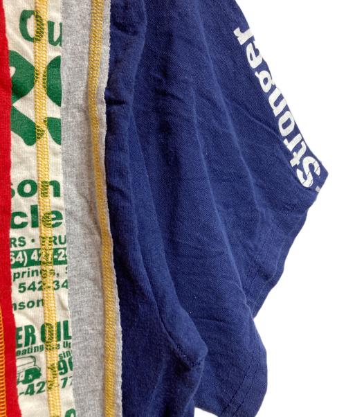 Rebuild by Needles（リビルドバイニードルス）Rebuild by Needles (リビルドバイニードルス) ユニオンTシャツ レッド サイズ:Sの古着・服飾アイテム