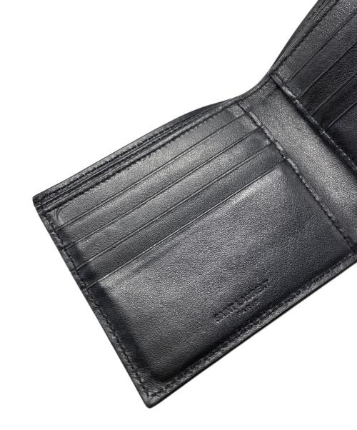Saint Laurent Paris（サンローランパリ）Saint Laurent Paris (サンローランパリ) スタープリントコンパクトウォレット ブラックの古着・服飾アイテム