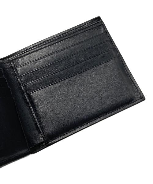 Saint Laurent Paris（サンローランパリ）Saint Laurent Paris (サンローランパリ) スタープリントコンパクトウォレット ブラックの古着・服飾アイテム