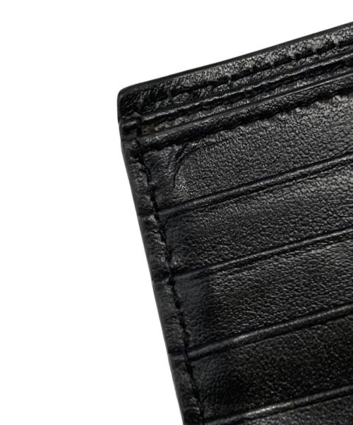 Saint Laurent Paris（サンローランパリ）Saint Laurent Paris (サンローランパリ) スタープリントコンパクトウォレット ブラックの古着・服飾アイテム