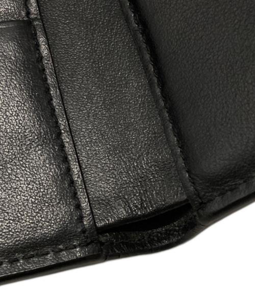 Saint Laurent Paris（サンローランパリ）Saint Laurent Paris (サンローランパリ) スタープリントコンパクトウォレット ブラックの古着・服飾アイテム