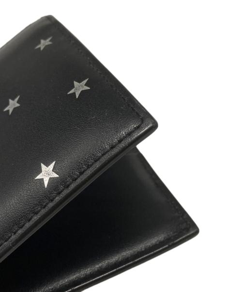 Saint Laurent Paris（サンローランパリ）Saint Laurent Paris (サンローランパリ) スタープリントコンパクトウォレット ブラックの古着・服飾アイテム