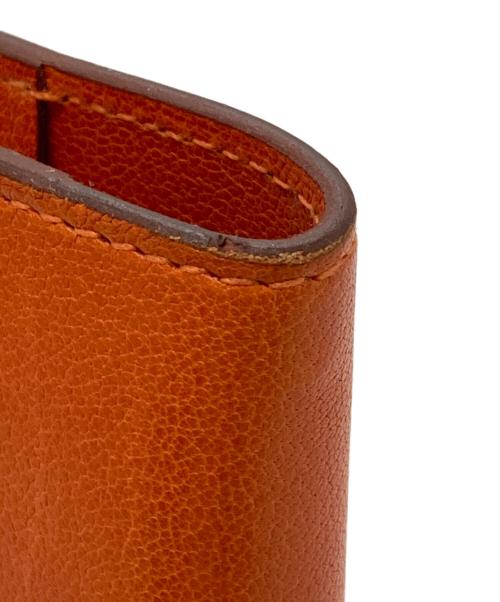 HERMES（エルメス）HERMES (エルメス) 手帳カバー オレンジの古着・服飾アイテム
