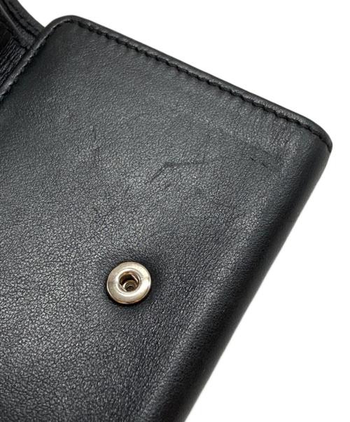 JIMMY CHOO（ジミーチュウ）JIMMY CHOO (ジミーチュウ) スタースタッズ3つ折り財布 ブラックの古着・服飾アイテム