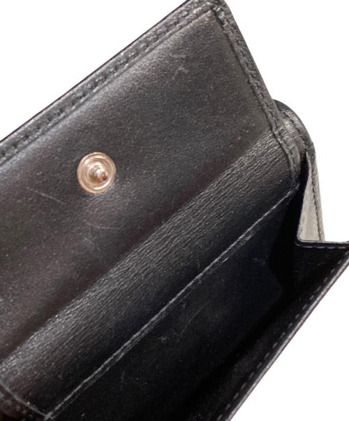 JIMMY CHOO（ジミーチュウ）JIMMY CHOO (ジミーチュウ) スタースタッズ3つ折り財布 ブラックの古着・服飾アイテム