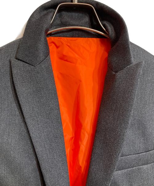DSQUARED2（ディースクエアード）DSQUARED2 (ディースクエアード) ドッキングテーラードジャケット オレンジ×グレー サイズ:50の古着・服飾アイテム