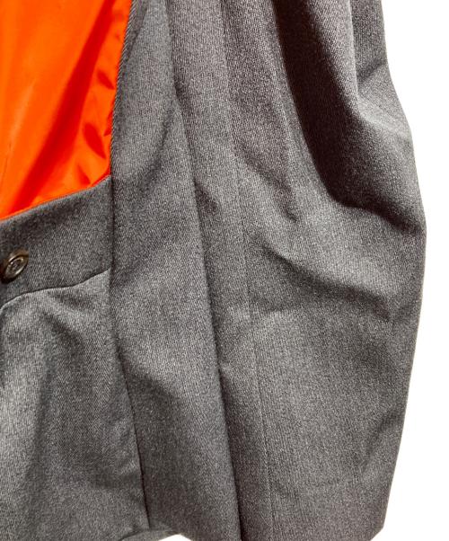 DSQUARED2（ディースクエアード）DSQUARED2 (ディースクエアード) ドッキングテーラードジャケット オレンジ×グレー サイズ:50の古着・服飾アイテム