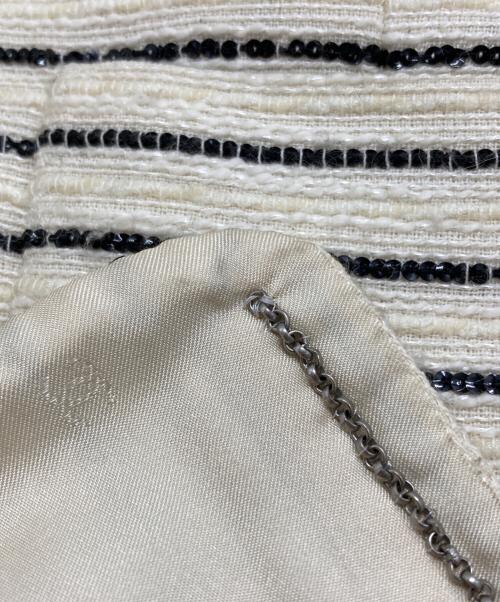 CHANEL（シャネル）CHANEL (シャネル) カメリア スパンコールボーダーノーカラージャケット ホワイト サイズ:38の古着・服飾アイテム