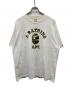 A BATHING APE（アベイシングエイプ）の古着「カレッジプリントTシャツ」｜ホワイト