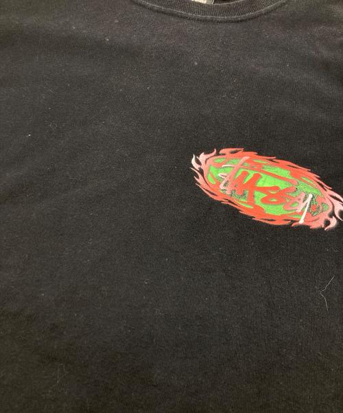 stussy（ステューシー）stussy (ステューシー) バーニングTee ブラック サイズ:	SIZE Mの古着・服飾アイテム