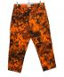 stussy（ステューシー）の古着「BIG OL' JEAN DENIM Kryptek Camo」｜オレンジ