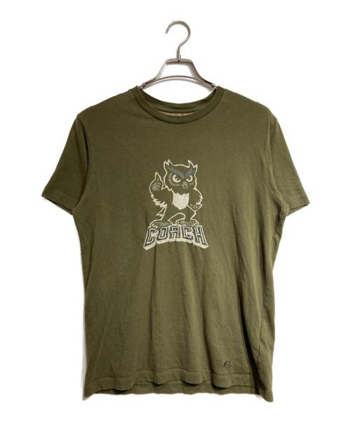 COACH（コーチ）COACH (コーチ) プリントTシャツ/printed t-shirt オリーブ サイズ:Sの古着・服飾アイテム