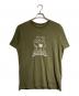 COACH（コーチ）の古着「プリントTシャツ/printed t-shirt」｜オリーブ