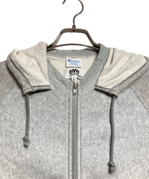 eYe COMME des GARCONS JUNYAWATANABE MAN（アイ コム デ ギャルソン ジュンヤ ワタナベ マン）eYe COMME des GARCONS JUNYAWATANABE MAN (アイ コム デ ギャルソン ジュンヤ ワタナベ マン) Champion (チャンピオン) 切替後付けジップフーディー グレー サイズ:XLの古着・服飾アイテム