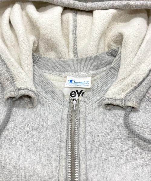 eYe COMME des GARCONS JUNYAWATANABE MAN（アイ コム デ ギャルソン ジュンヤ ワタナベ マン）eYe COMME des GARCONS JUNYAWATANABE MAN (アイ コム デ ギャルソン ジュンヤ ワタナベ マン) Champion (チャンピオン) 切替後付けジップフーディー グレー サイズ:XLの古着・服飾アイテム