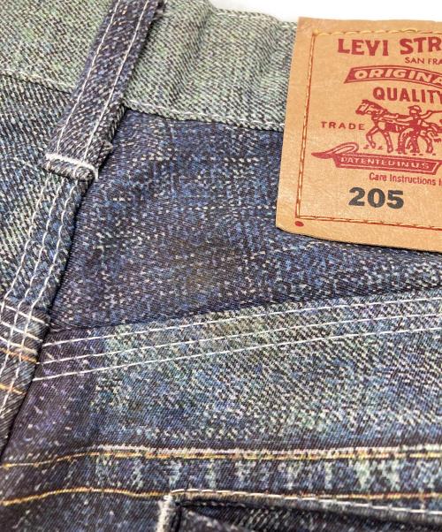 COMME des GARCONS JUNYA WATANABE MAN（コム デ ギャルソン ジュンヤ ワタナベ マン）COMME des GARCONS JUNYA WATANABE MAN (コム デ ギャルソン ジュンヤ ワタナベ マン) LEVI'S (リーバイス) 転写デニムパンツ インディゴ サイズ:Ｓの古着・服飾アイテム