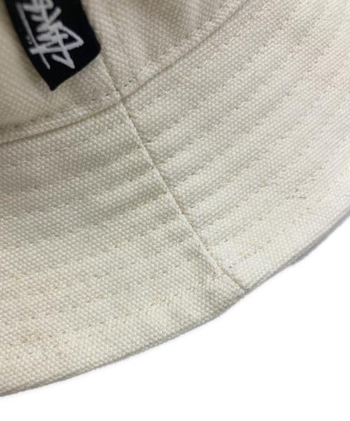 stussy（ステューシー）stussy (ステューシー) COMME des GARCONS (コムデギャルソン) バケットハット ベージュの古着・服飾アイテム