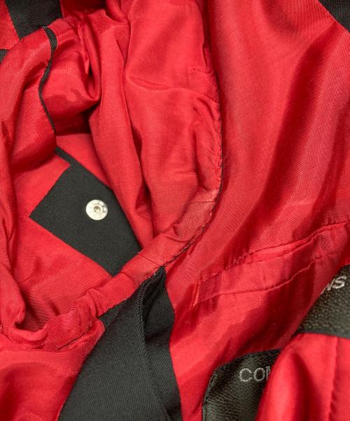 COMME des GARCONS HOMME PLUS（コムデギャルソンオムプリュス）COMME des GARCONS HOMME PLUS (コムデギャルソンオムプリュス) ウールギャバスタッズロングジャケット ブラック サイズ:Sの古着・服飾アイテム