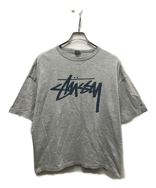 Champion（チャンピオン）Champion (チャンピオン) stussy (ステューシー) コラボTシャツ グレー サイズ:Mの古着・服飾アイテム