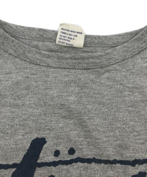Champion（チャンピオン）Champion (チャンピオン) stussy (ステューシー) コラボTシャツ グレー サイズ:Mの古着・服飾アイテム