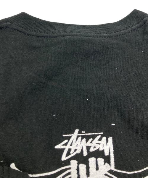 stussy（ステューシー）stussy (ステューシー) UNDEFEATED (アンディフィーテッド) WORDWIDE TEE ブラック サイズ:	SIZE Lの古着・服飾アイテム