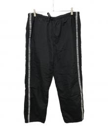 SUPREME（シュプリーム）の古着「TONAL TAPING TRACK PANTS」｜ブラック
