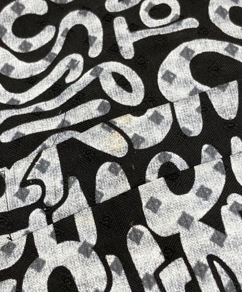 BLACK COMME des GARCONS（ブラックコムデギャルソン）BLACK COMME des GARCONS (ブラックコムデギャルソン) メッセージプリント・ポリジャガードジャケット/Message print polyester jacquard jacket ブラック サイズ:Lの古着・服飾アイテム