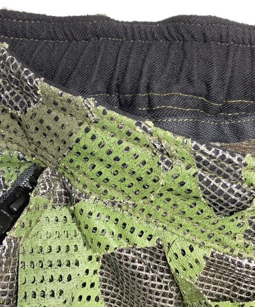 TIRED・TV（タイアード・ティーヴィー）TIRED・TV (タイアード・ティーヴィー) HIDE&SEEK CONVERTIBLE OVERPANT DESERT CAMO/ハイドアンドシーク・コンバーチブル・オーバーパンツ（デザートカモ柄） グリーン サイズ:Sの古着・服飾アイテム
