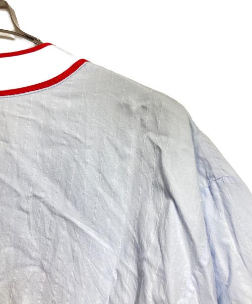 CHRISTIAN DADA（クリスチャンダダ）CHRISTIAN DADA (クリスチャンダダ) LIQUIDATED ロングベースボールシャツ / LIQUIDATED Long Baseball Shirt レッド×ブルー サイズ:44の古着・服飾アイテム