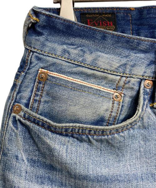 EVISU（エヴィス）EVISU (エヴィス) 大黒プリント キャロットフィット ジーンズ/Denim Pants インディゴ サイズ:30×34の古着・服飾アイテム