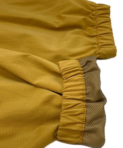 GRAMICCI（グラミチ）GRAMICCI (グラミチ) F/CE. (エフシーイー) テックコーチジャケット/Tech Coach Jacket イエロー サイズ:Lの古着・服飾アイテム