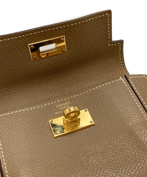 HERMES（エルメス）HERMES (エルメス) ケリー・ポケットコンパクト/Kelly Pocket Compact ブラウンの古着・服飾アイテム