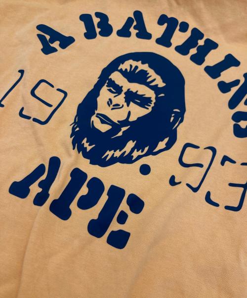 BAPE BY A BATHING APE（ベイプバイアベイシングエイプ）BAPE BY A BATHING APE (ベイプバイアベイシングエイプ) OG APE HEAD COLLEGE RELAXED FIT TEE オレンジ サイズ:Ｍの古着・服飾アイテム