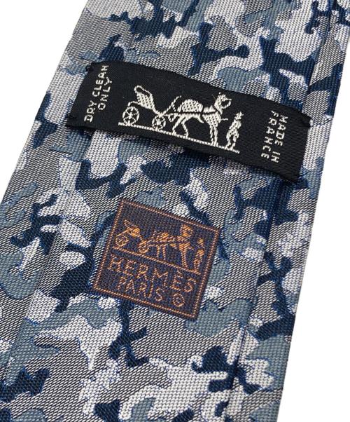 HERMES（エルメス）HERMES (エルメス) ジャガードカモフラージュ柄ネクタイ/Jacquard camouflage tie ブルー×グレー サイズ:－の古着・服飾アイテム