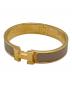 HERMES（エルメス）の古着「クリックHエナメルブレスレット/Hermès Clic H enamel bracelet」｜ゴールド×ブラウン