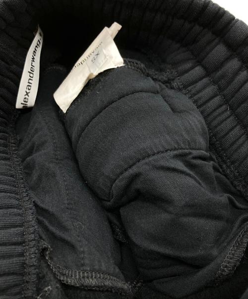 ALEXANDER WANG.T（アレキサンダーワンティー）ALEXANDER WANG.T (アレキサンダーワンティー) エンボスロゴスウェットパンツ/Embossed Logo Sweatpants ブラック サイズ:XSの古着・服飾アイテム