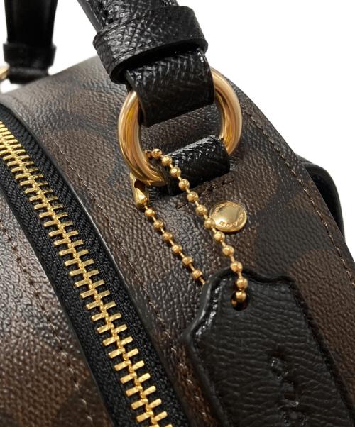 COACH（コーチ）COACH (コーチ) SIGNATURE JORDYN BACKPACK/ シグネチャー ジョーディン バックパック ブラック×ブラウン サイズ:不明の古着・服飾アイテム