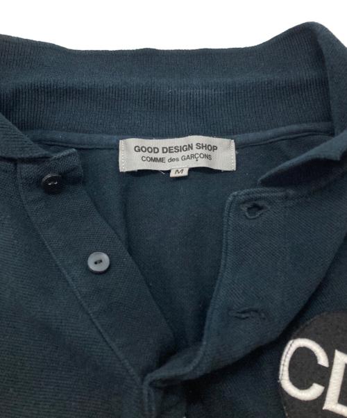 GOOD DESIGN SHOP COMME des GARCONS（グッドデザインショップ コムデギャルソン）GOOD DESIGN SHOP COMME des GARCONS (グッドデザインショップ コムデギャルソン) ロゴプリントポロシャツ/Logo-print polo shirt ブラック サイズ:Mの古着・服飾アイテム