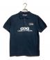 GOOD DESIGN SHOP COMME des GARCONS（グッドデザインショップ コムデギャルソン）の古着「ロゴプリントポロシャツ/Logo-print polo shirt」｜ブラック