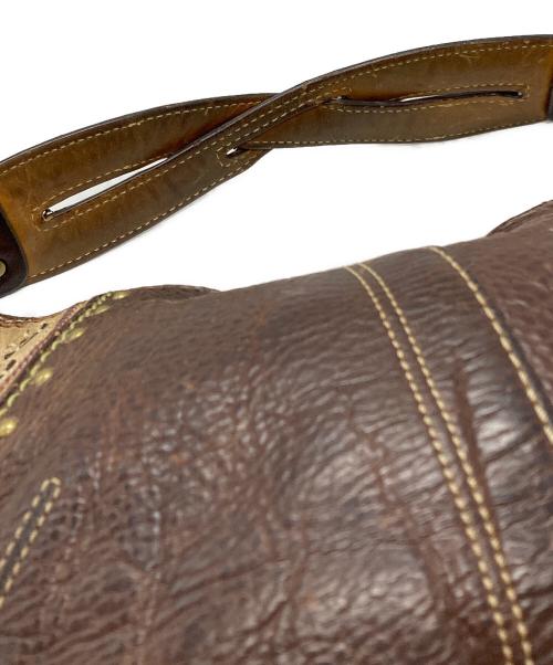 COACH（コーチ）COACH (コーチ) ハーフムーンスタッズワンショルダーバッグ/Half-Moon Studded One-Shoulder Bag ブラウン サイズ:不明の古着・服飾アイテム