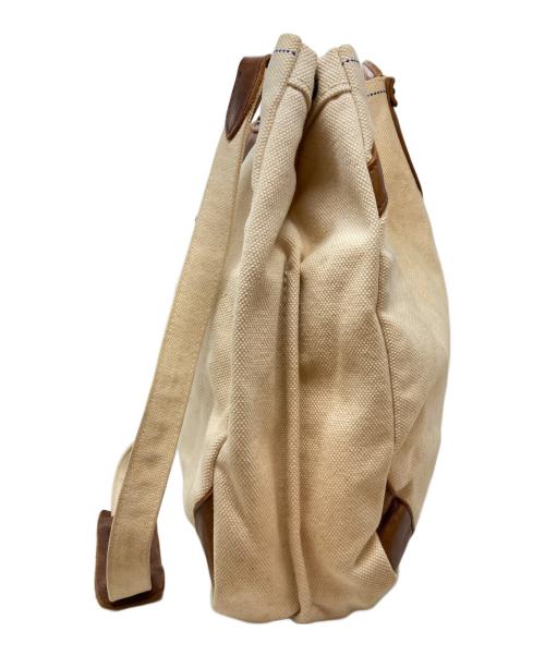 KAPITAL（キャピタル）KAPITAL (キャピタル) キャンバス×レザー 2wayバッグ/Canvas and Leather 2Way Bag ベージュ×ブラウンの古着・服飾アイテム