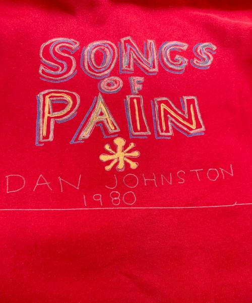 thisisneverthat（ディスイズネバーザット）thisisneverthat (ディスイズネバーザット) Daniel Johnston (ダニエル・ジョンストン) SONGS of PAIN Faded Zip Up Hoodie レッド サイズ:XLの古着・服飾アイテム