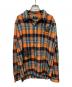 stussy（ステューシー）の古着「00sグラフィックプリントチェックシャツ」｜オレンジ