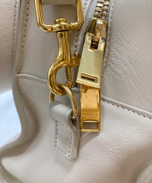 Saint Laurent Paris（サンローランパリ）Saint Laurent Paris (サンローランパリ) ベイビー カバス モノグラム 2WAYバッグ ホワイトの古着・服飾アイテム