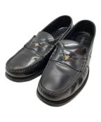 PRADAプラダ）の古着「ロゴペニーレザーローファー/Logo-embellished leather penny loafers」｜ブラック