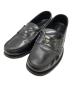 PRADA（プラダ）の古着「ロゴペニーレザーローファー/Logo-embellished leather penny loafers」｜ブラック
