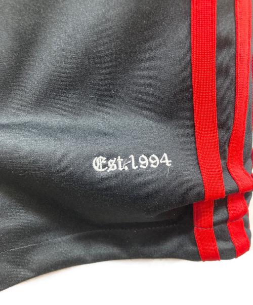 adidas Originals（アディダスオリジナル）adidas originals (アディダスオリジナル) korn (コーン) リバーシブルTRACK PANT パープル×ブラック サイズ:Sの古着・服飾アイテム