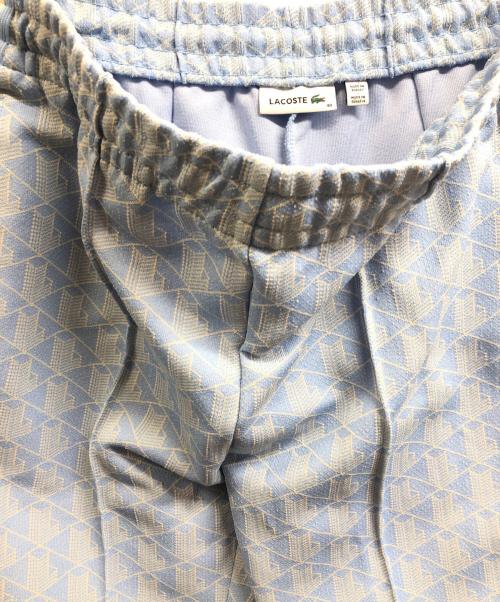 LACOSTE（ラコステ）LACOSTE (ラコステ) モノグラムジャカードトラックパンツ ブルー サイズ:40の古着・服飾アイテム