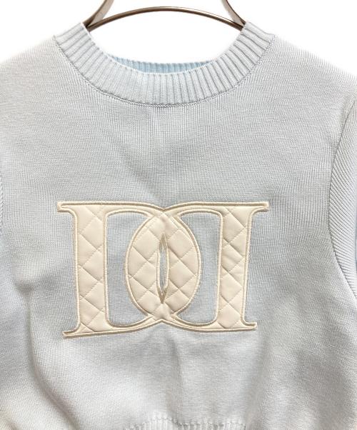 darich（ダーリッチ）Darich (ダーリッチ) バックオープンアップリケニットトップス ブルー サイズ:Free 未使用品の古着・服飾アイテム