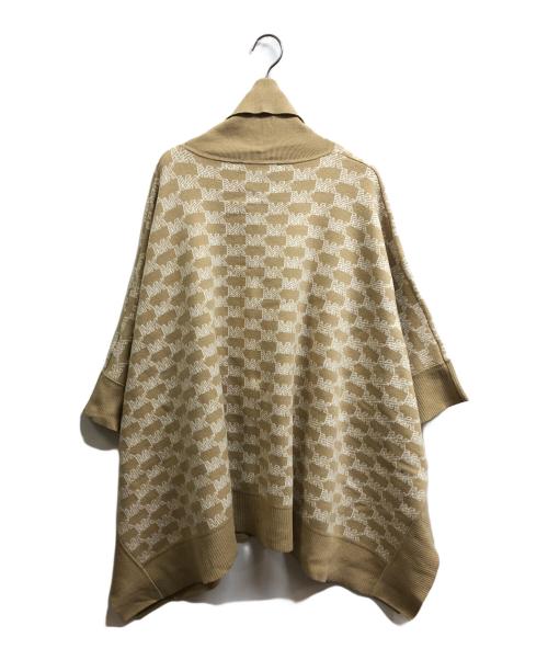 MICHAEL KORS（マイケル・コース）MICHAEL KORS (マイケルコース) ロゴグラムニットポンチョ ベージュ サイズ:L/XLの古着・服飾アイテム